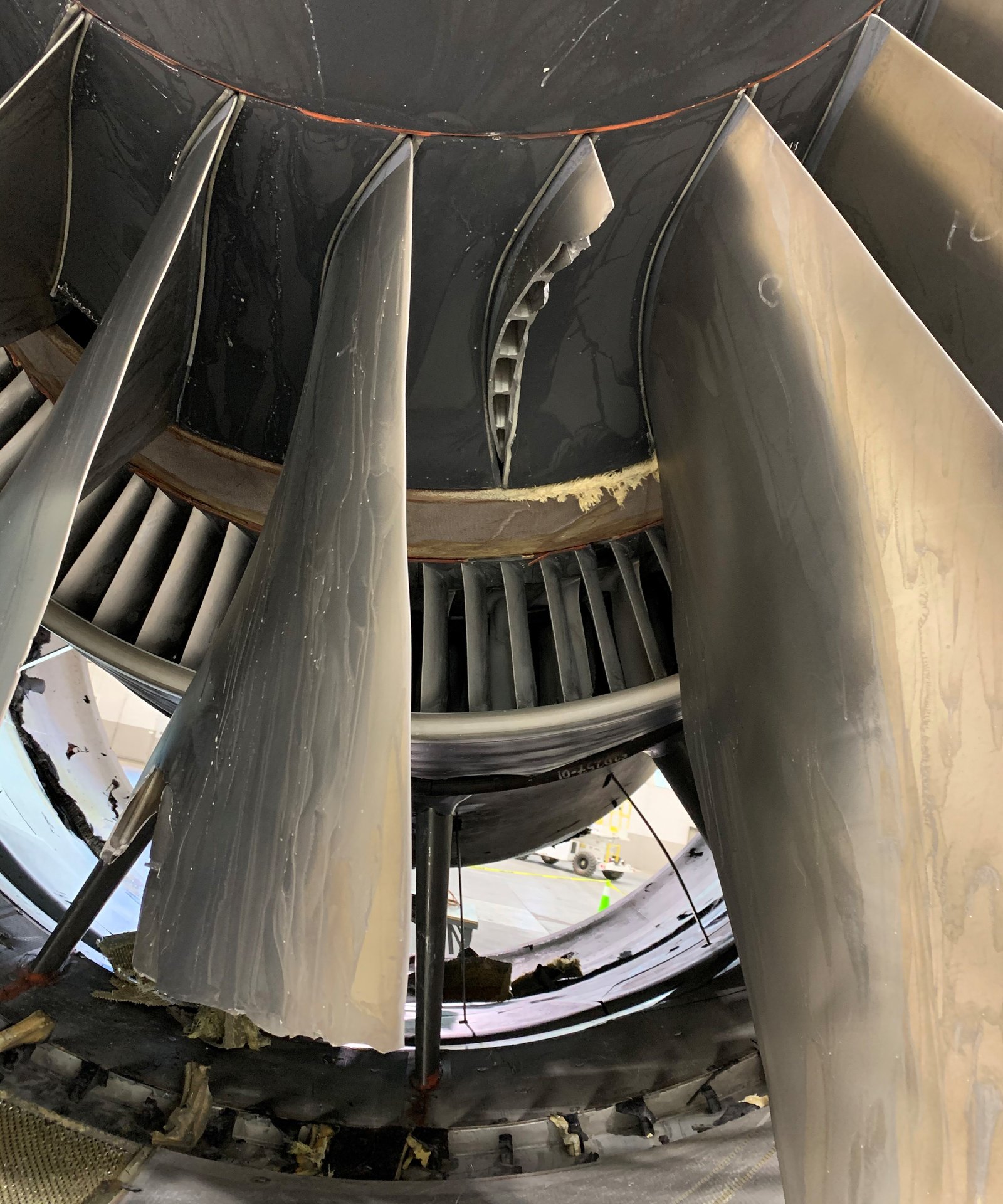 The fractured fan blade of Flight 328 revealed a fatigue crack originating within the hollow blade.